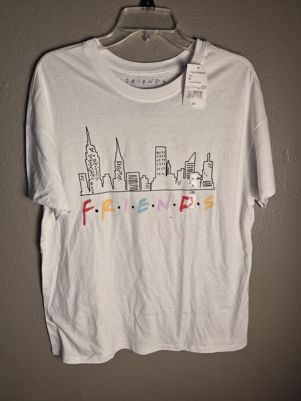 FRIENDS White Tee with Multicolor Logo and Skyline